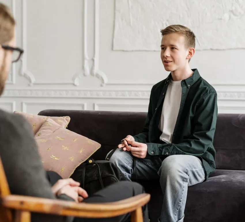 A teen with his therapist